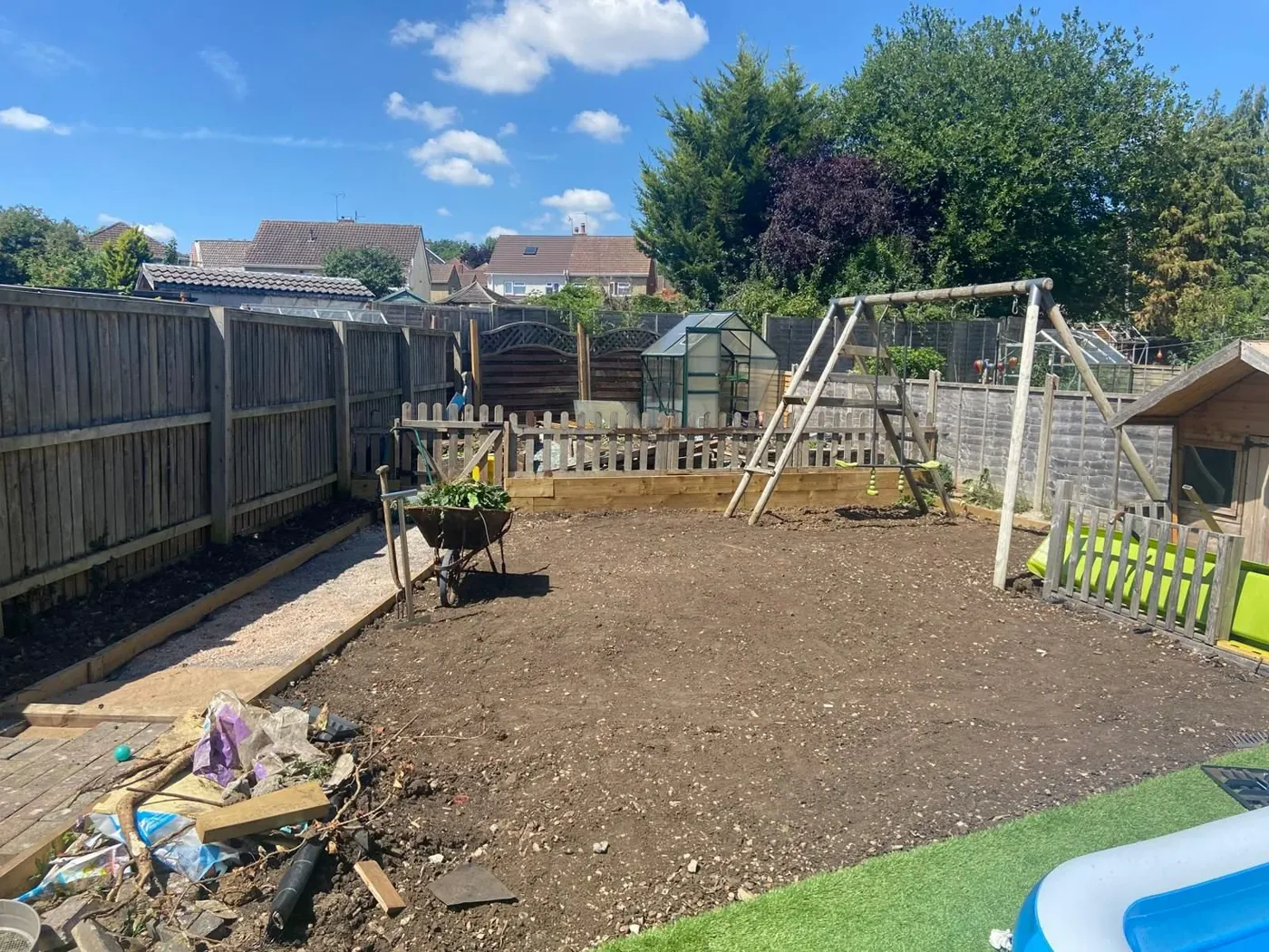 Right Pear team levelling a family's garden, 2025